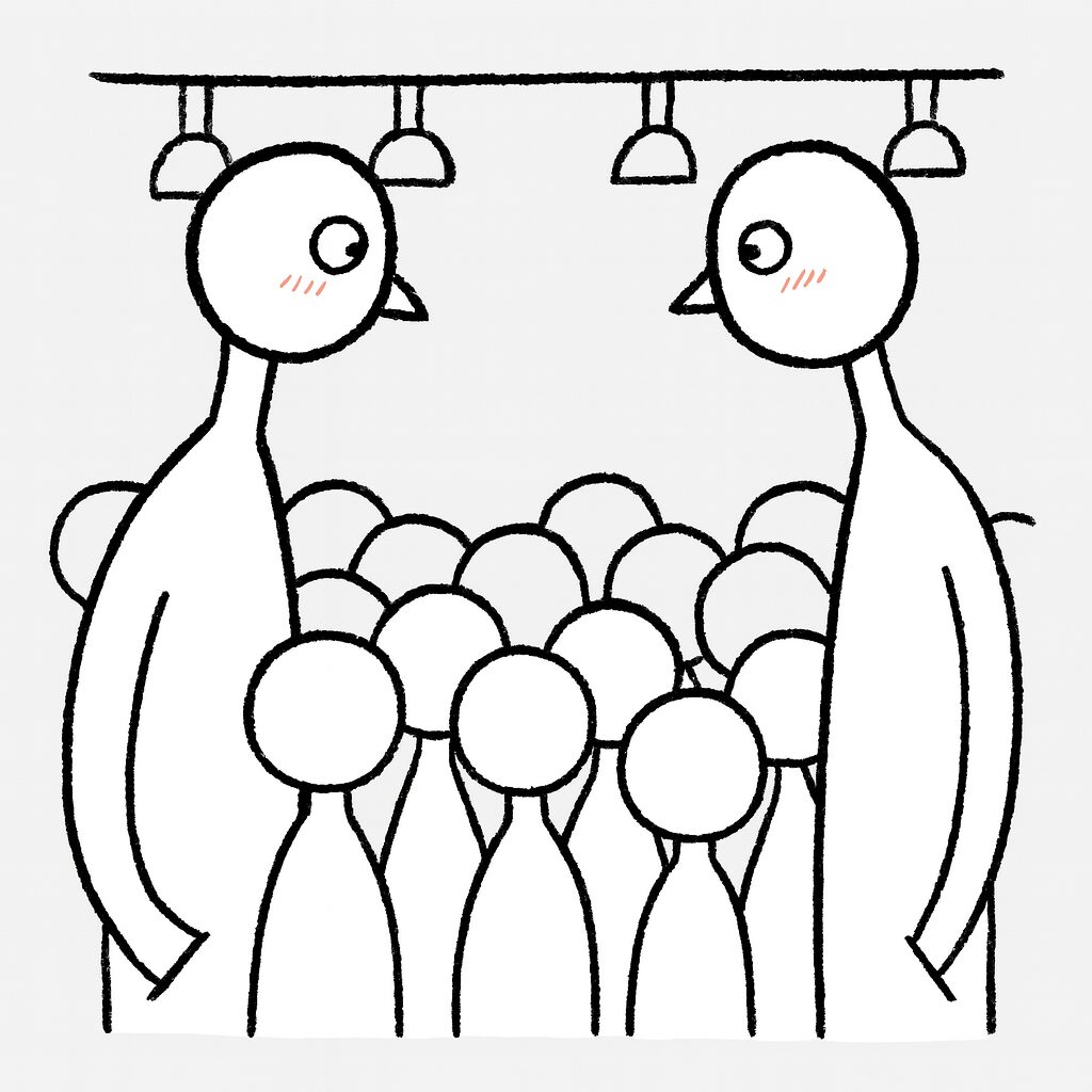 満員電車の中、頭ひとつ飛び出した二人のタッカーズが、乗客たちの頭上越しに目を合わせて照れている様子を描いたユーモラスなイラスト。